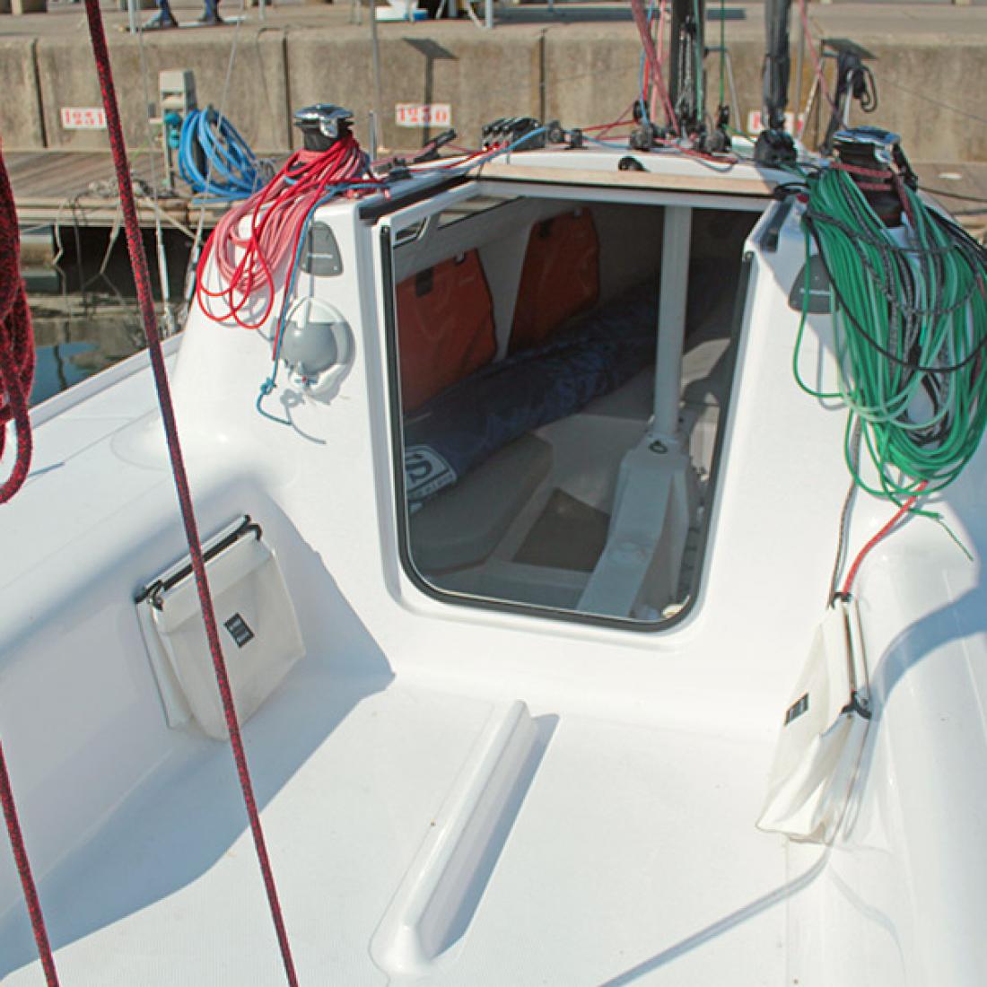 first beneteau racing sail boat barcelona spain day trip cherter sailing fast fun